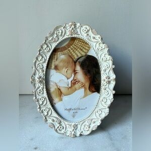 Ornate oval picture frame antique style